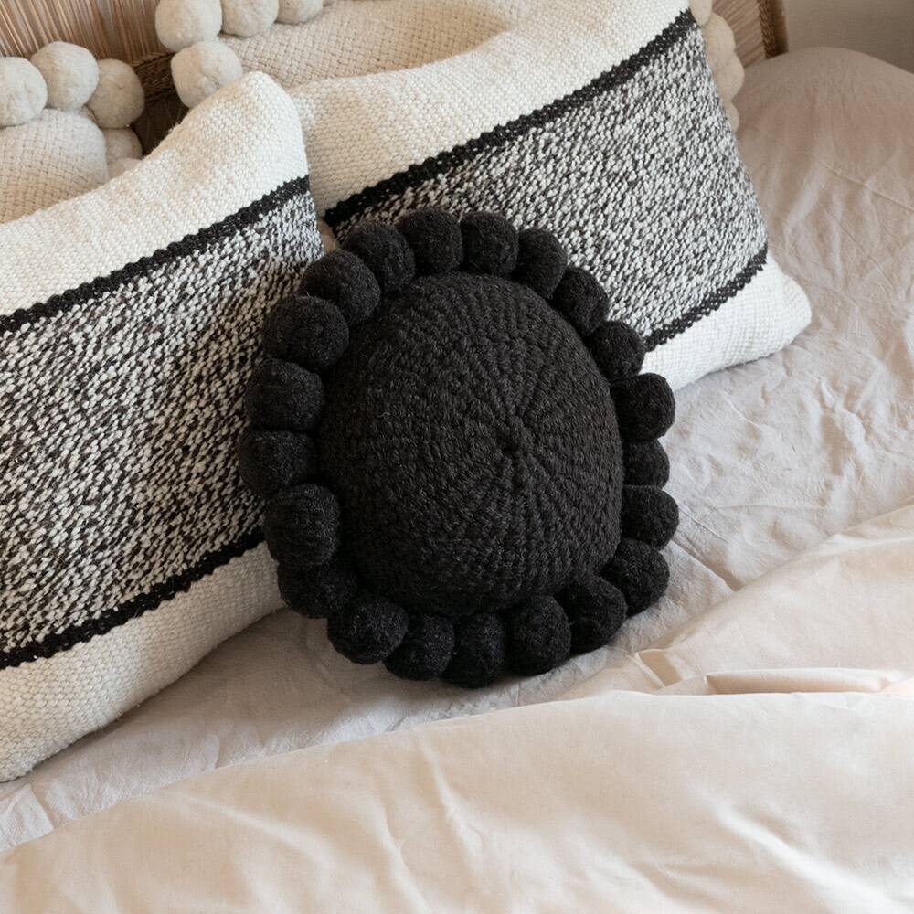 Mini round black wool pompom cushion