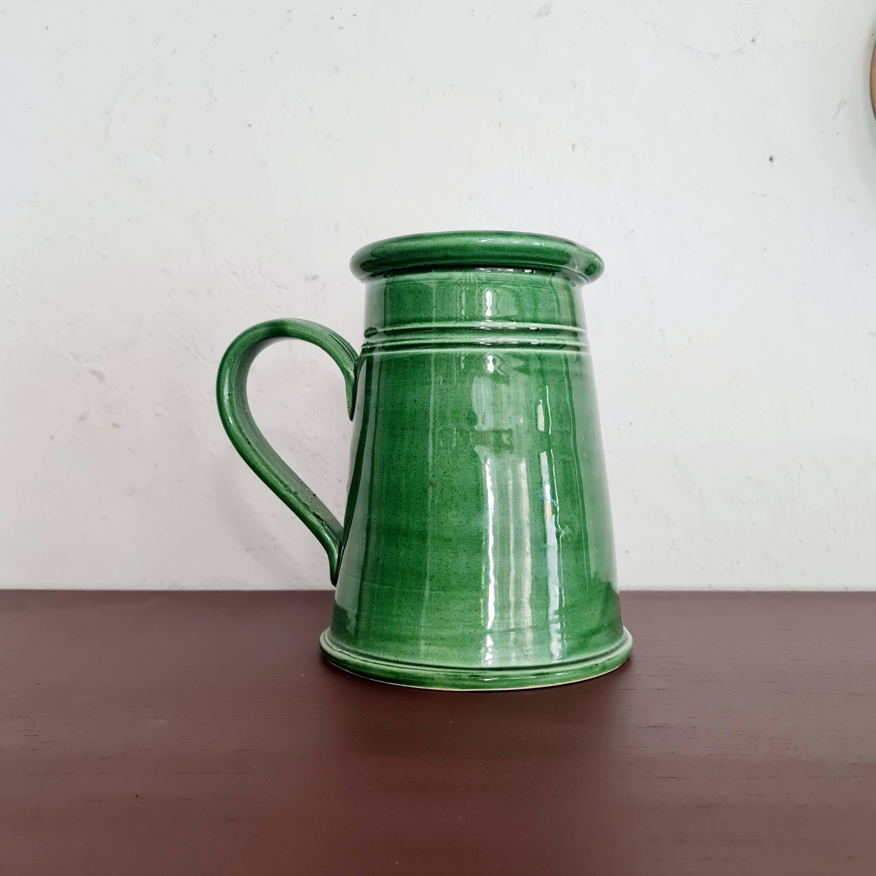Green glazed terracotta pitcher
