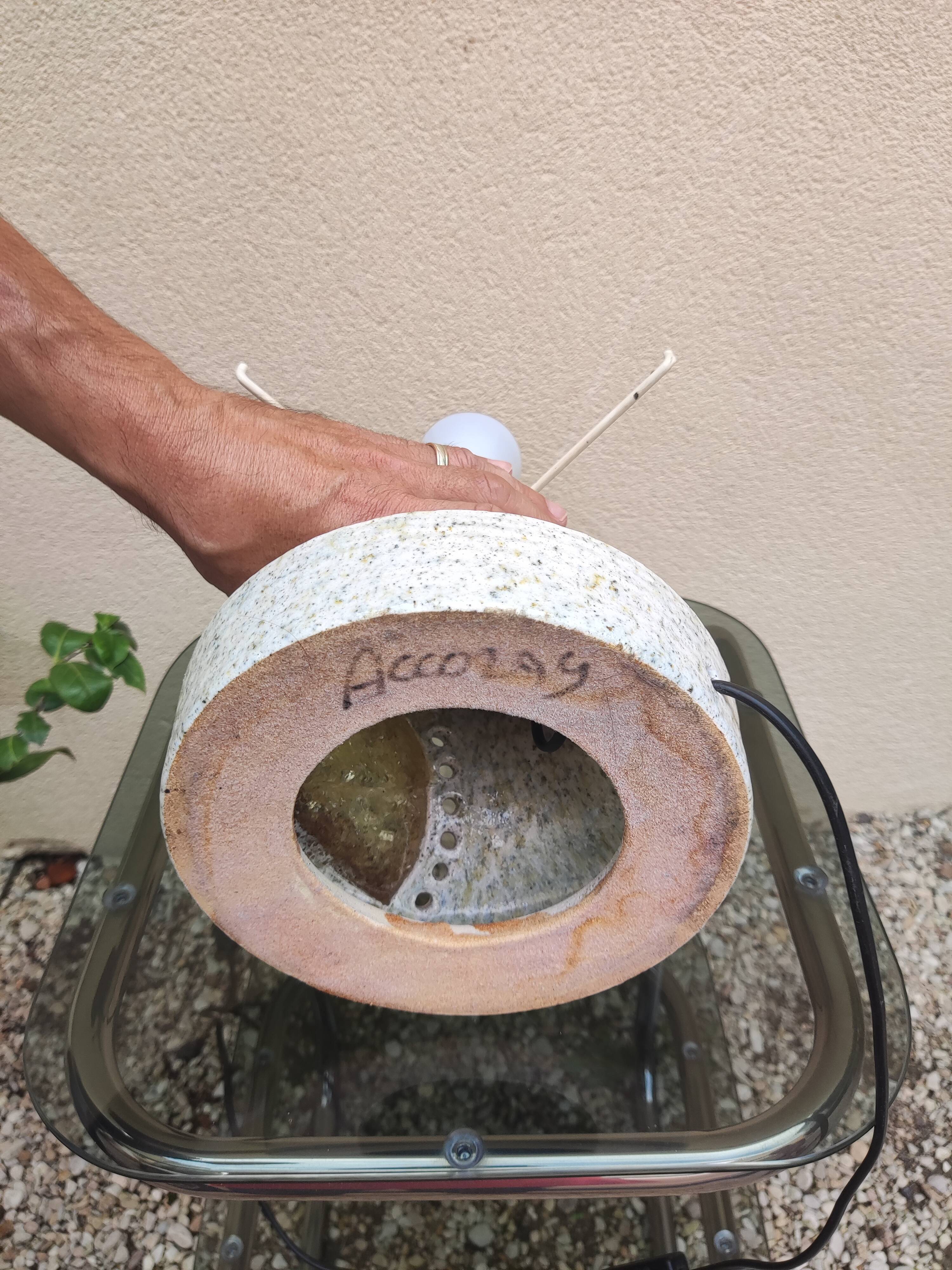 Bedside lamp in sandstone accolay