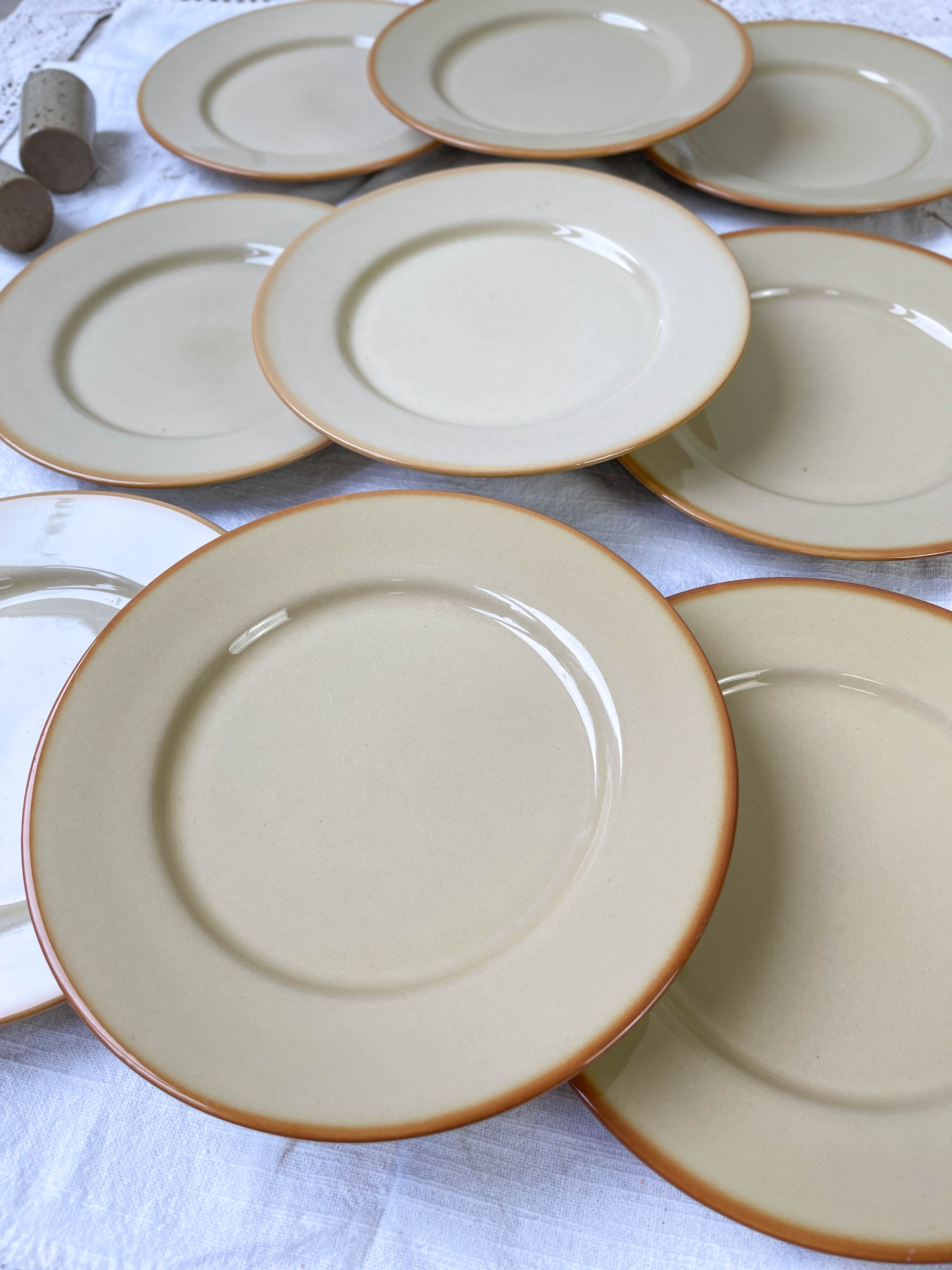 9 mid-century beige Tulowice stoneware plates