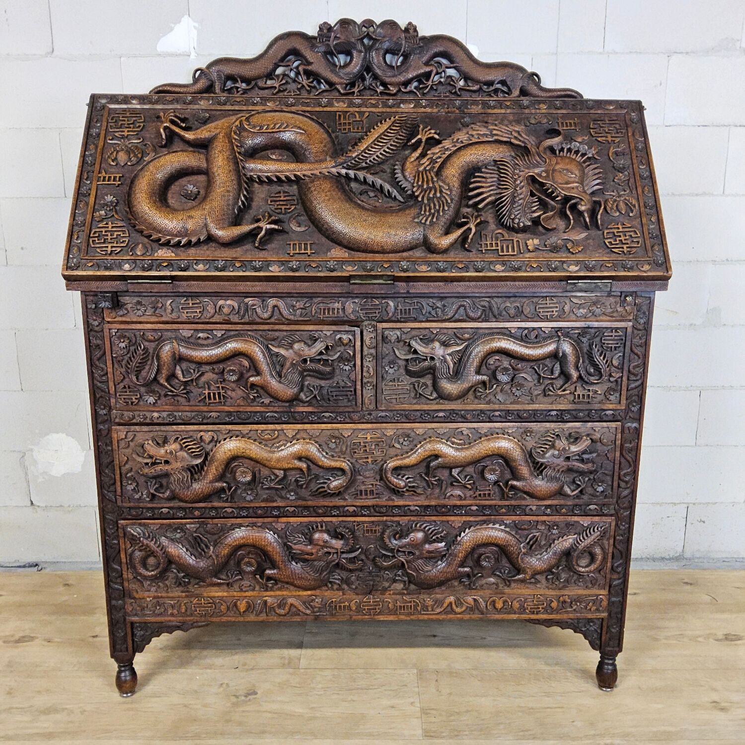 Antique 19th-century Chinese secretary with dragon woodcarving