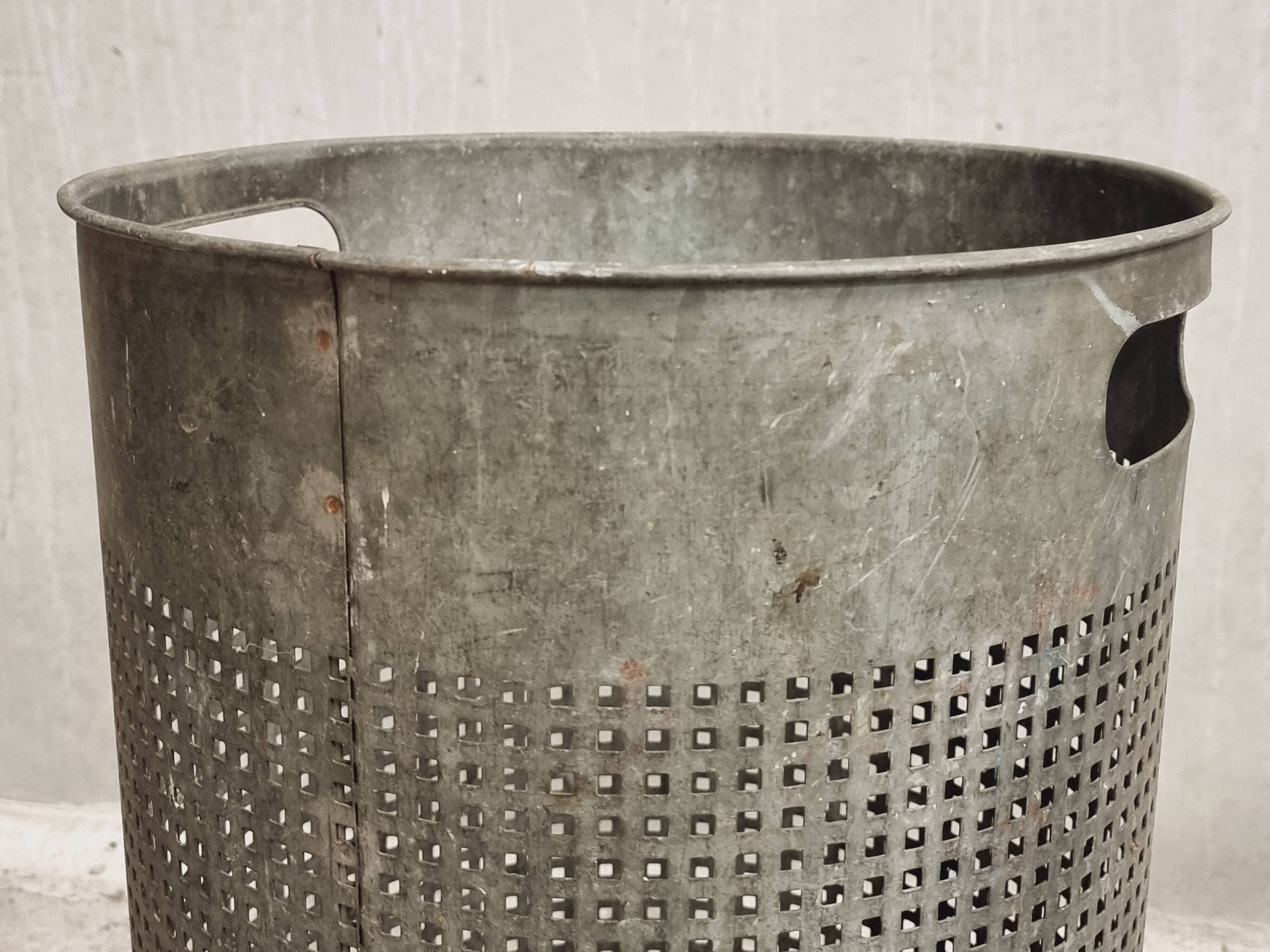 Vintage set of perforated metal waste bins