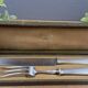 Christofle meat service in a monogrammed AR box.