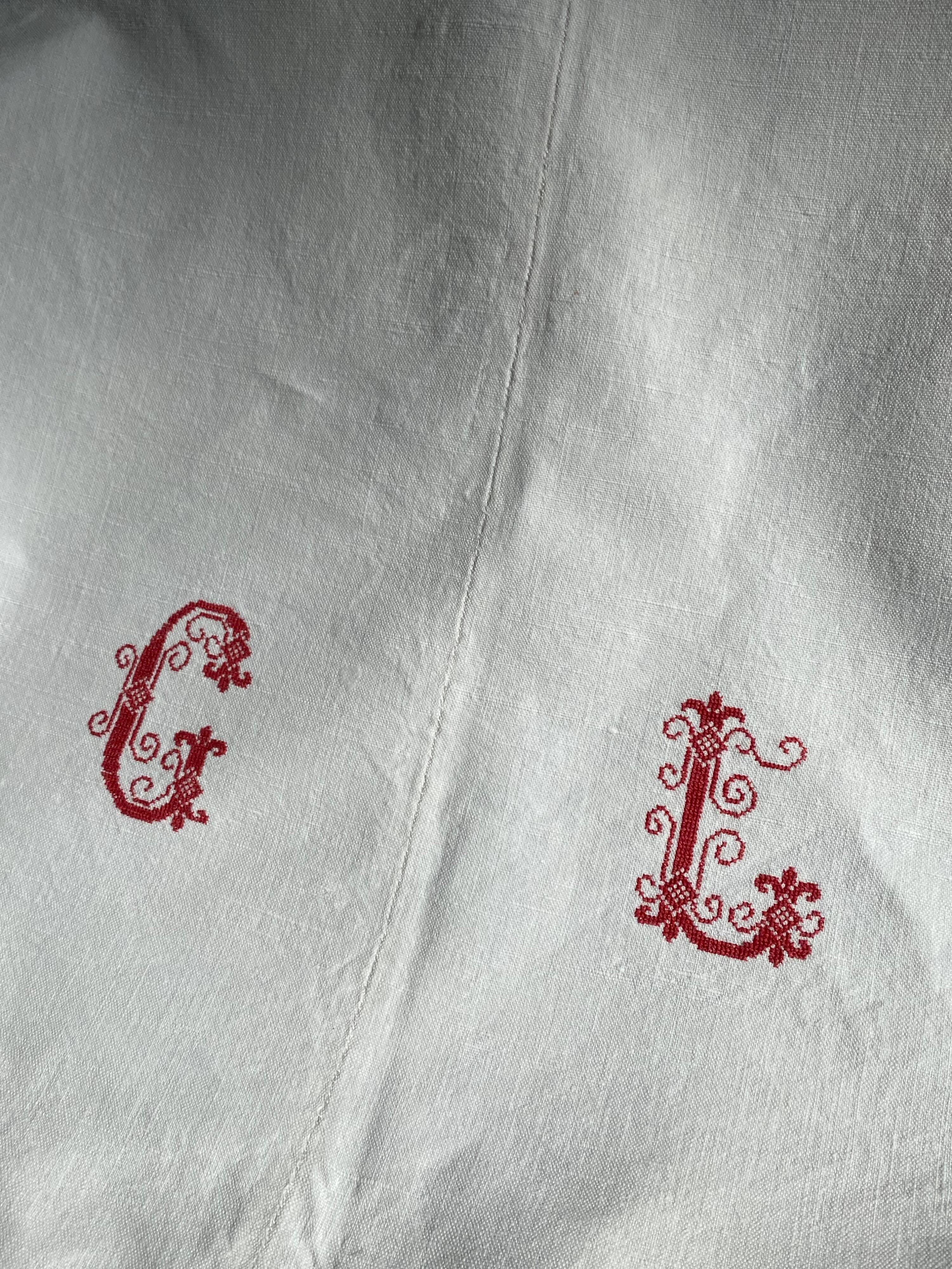 Old sheet with monogram