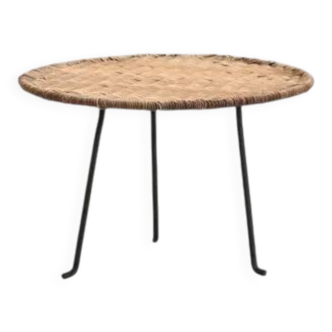 Round rattan side table by Raoul Guys