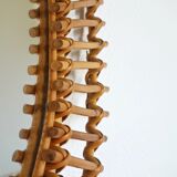 Free-form sun mirror in 60s rattan