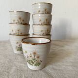 Stoneware egg cups, floral decoration