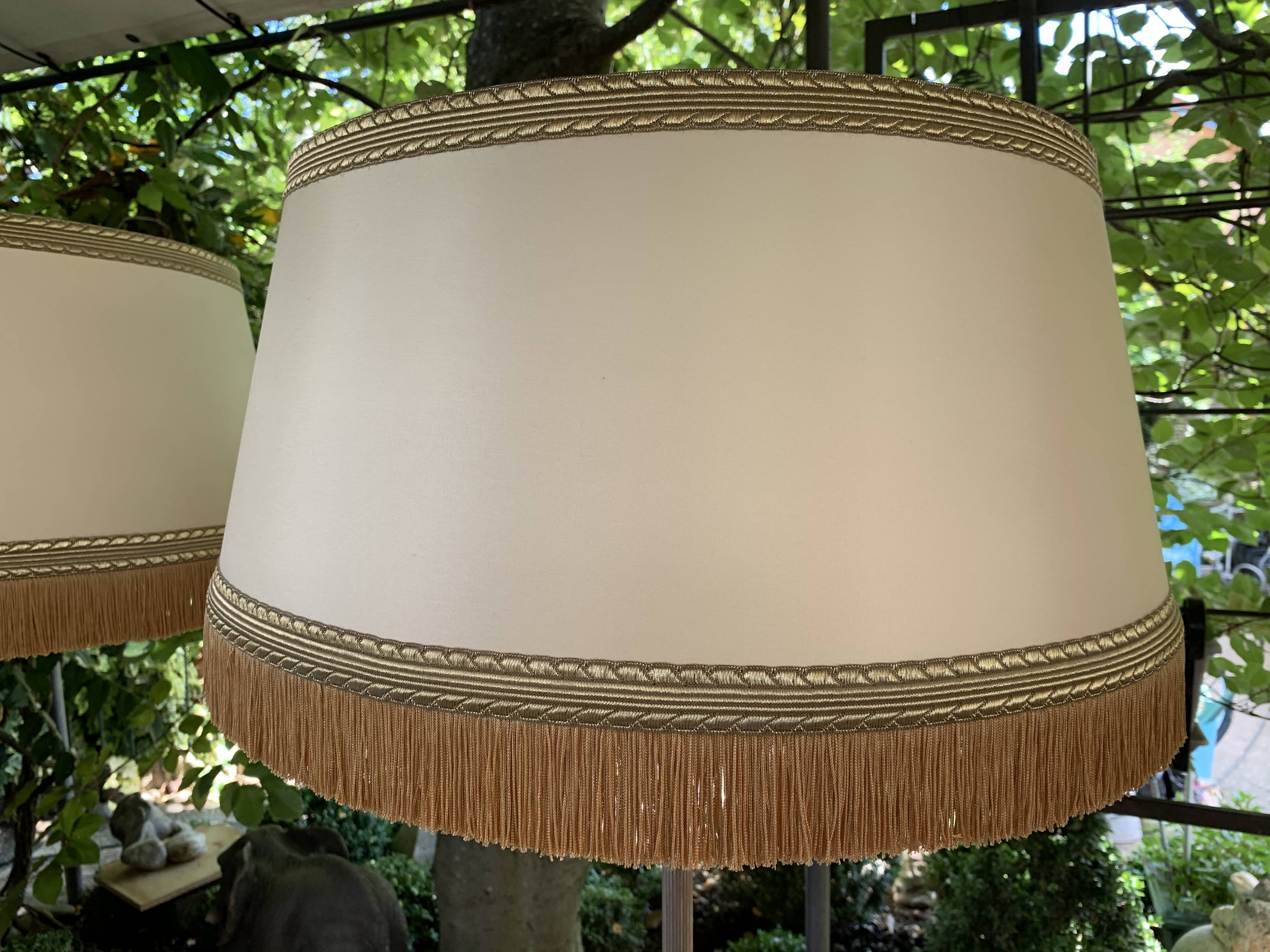 Pair of tripod lampposts 1960