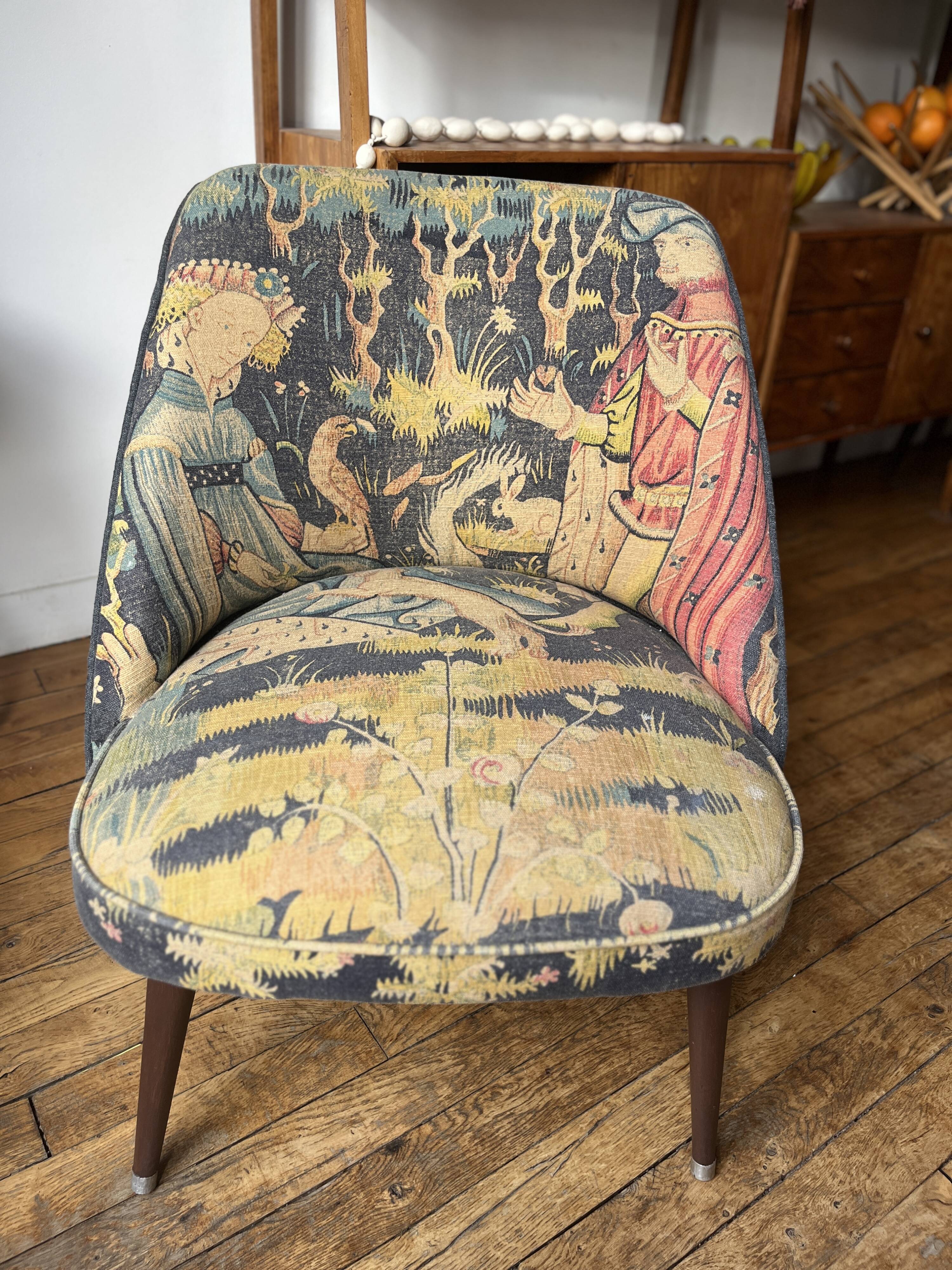J. Tenreiro, Brazil. Concha armchair with tapered legs, Cluny tapestry 1400.