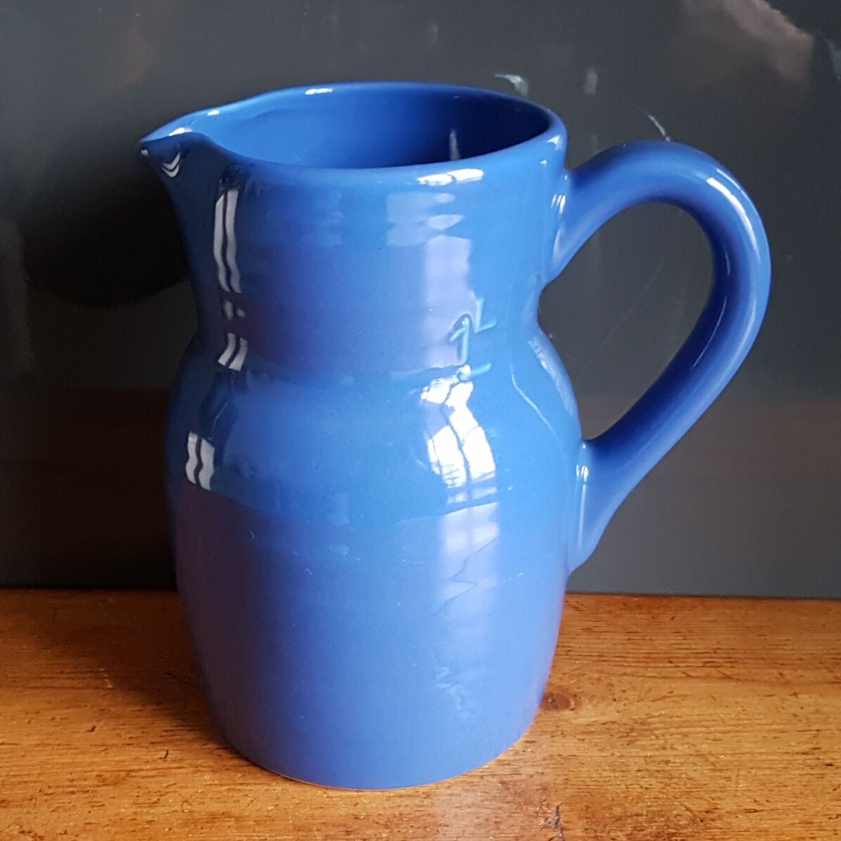 Blue ceramic pitcher