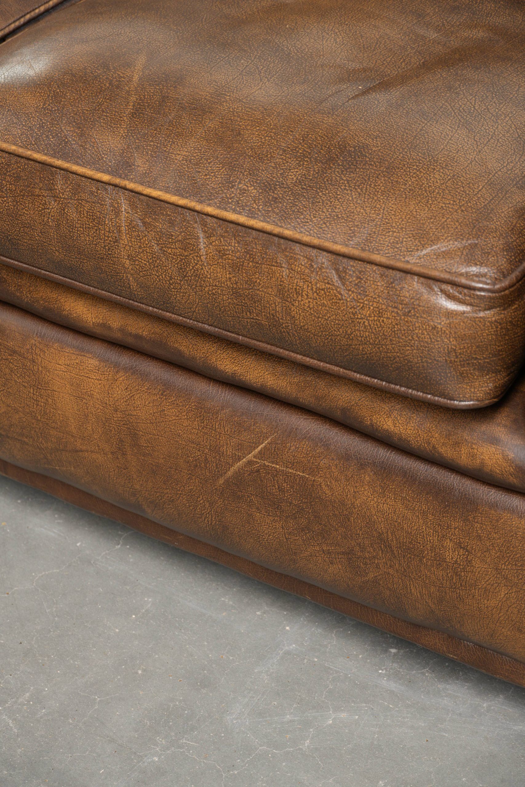 English cowhide leather Chesterfield 2-seater sofa in a luxurious colour