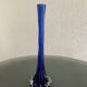 Twisted single-stem vase
