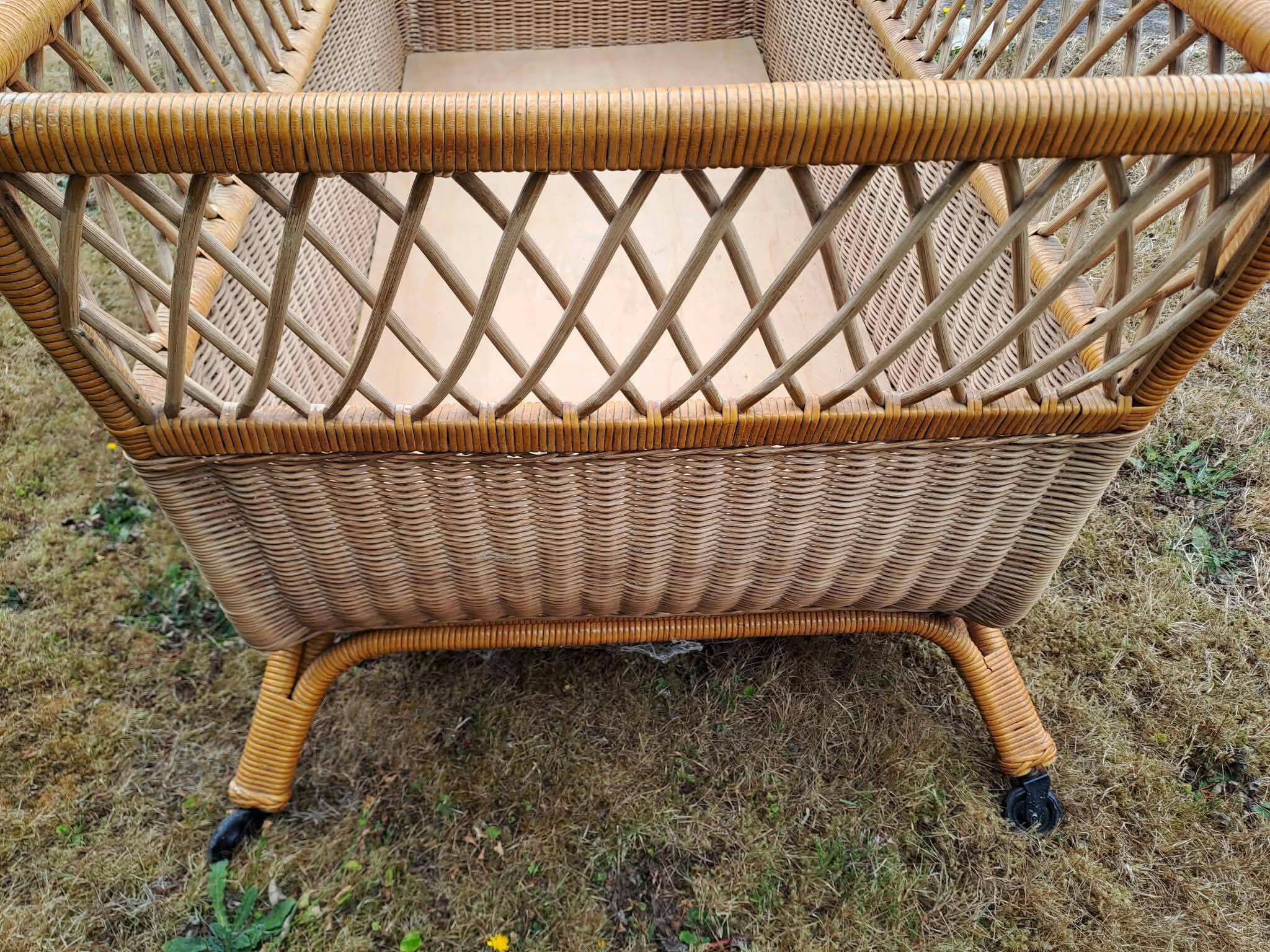 Rattan cradle.