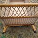 Rattan cradle.