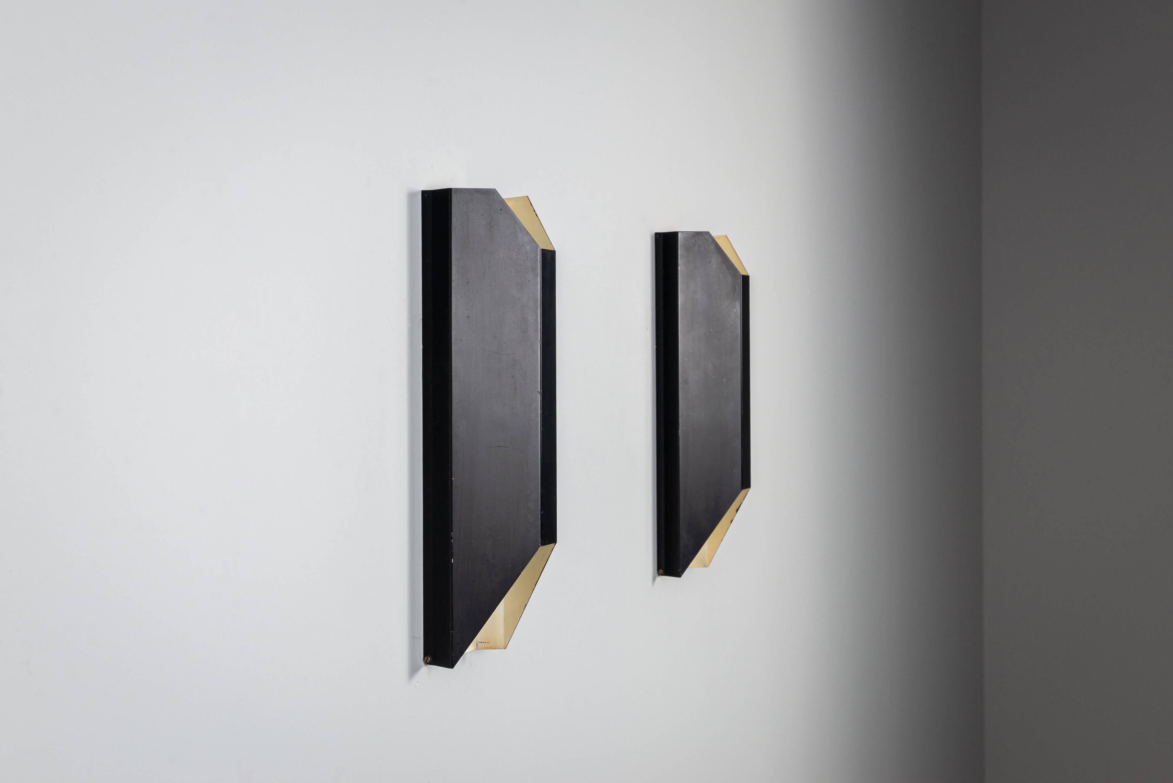 Architectural pair of vintage black metal wall lamps with angular geometric