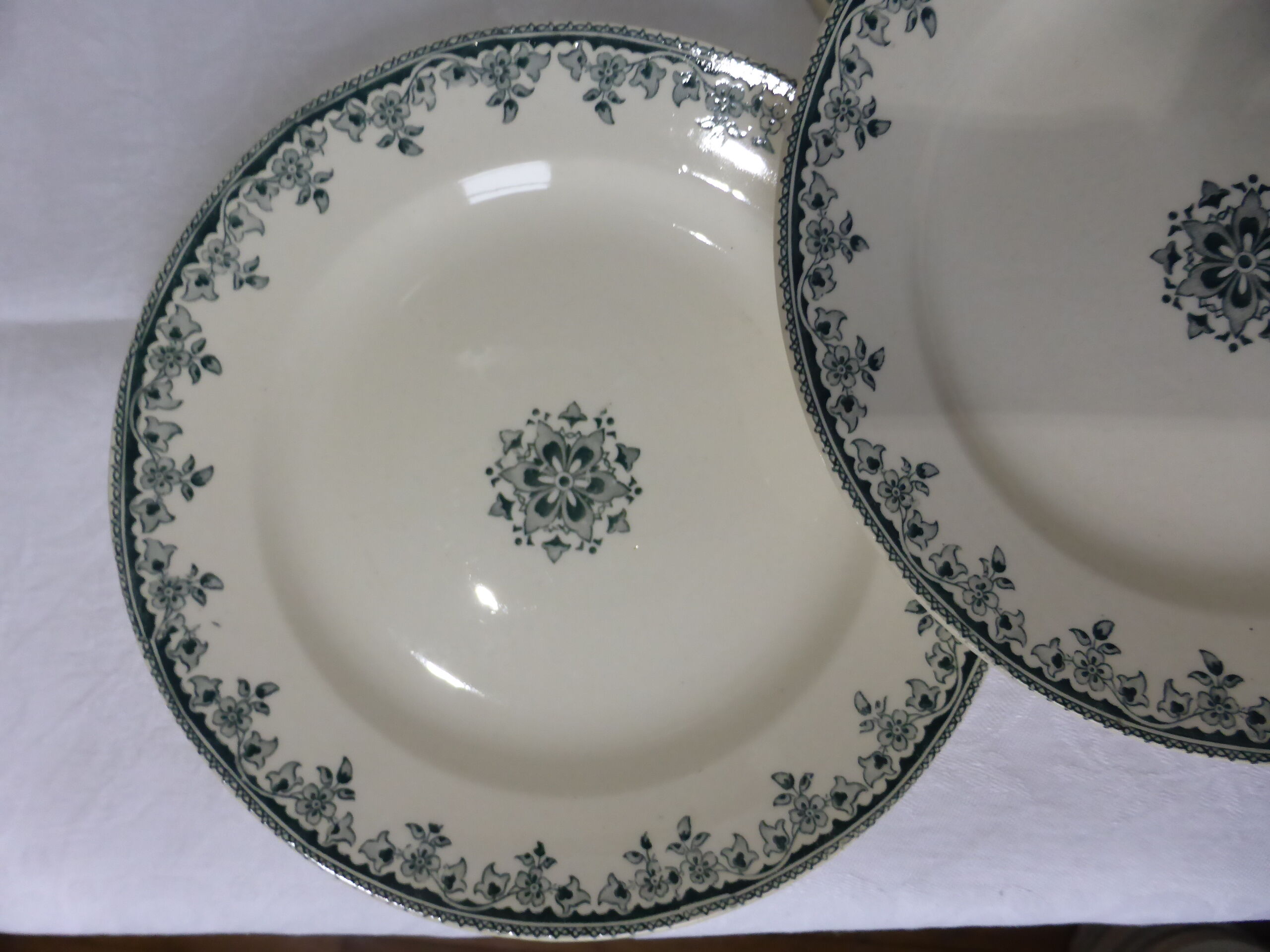 4 vintage flat plates in iron earth from HBC
