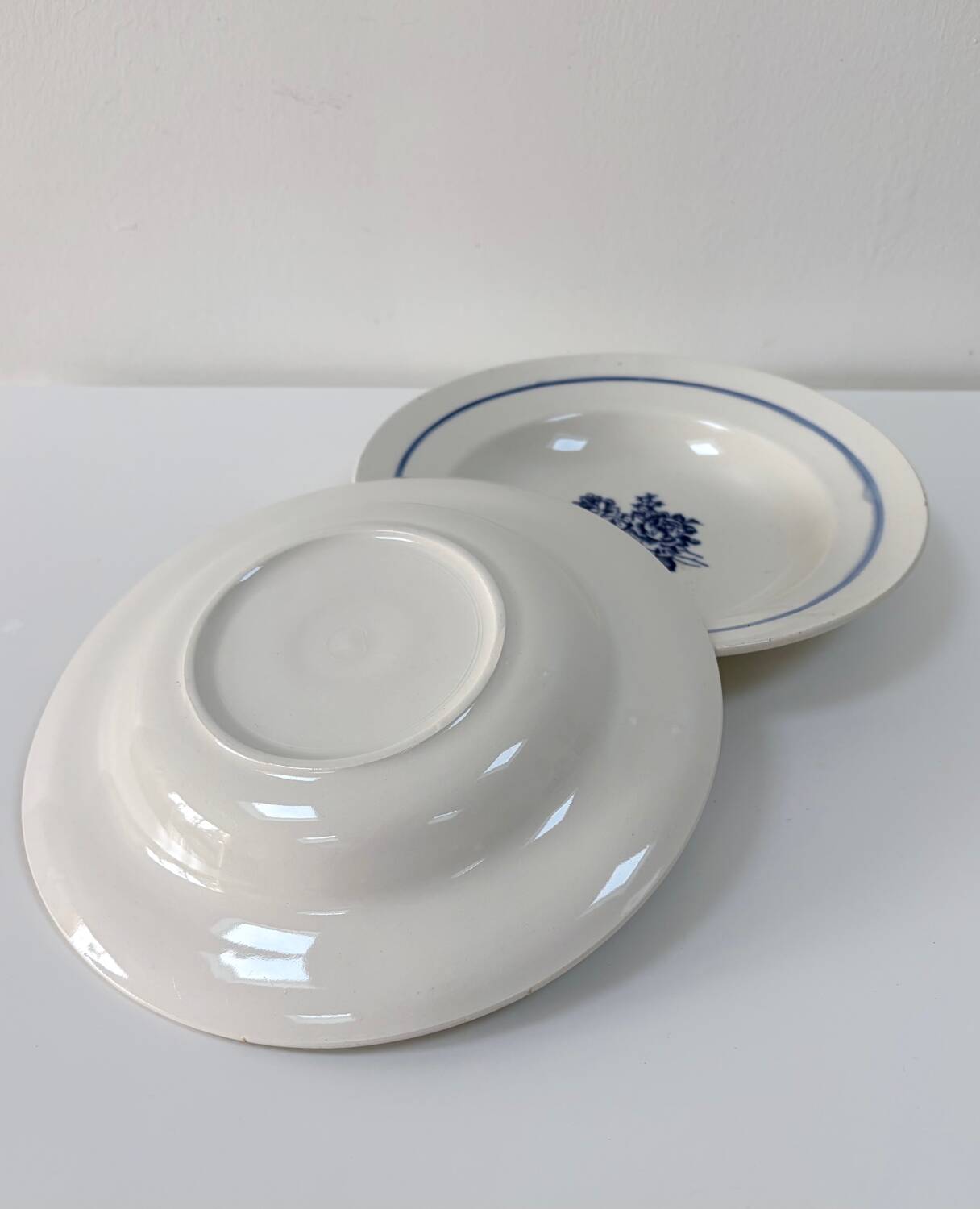 Pair of old hollow plates in earthenware