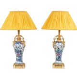 Pair of porcelain lamps decorated with bronze satyrs. Circa 1880.