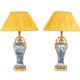 Pair of porcelain lamps decorated with bronze satyrs. Circa 1880.