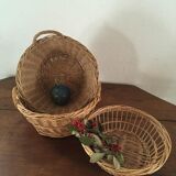 Three natural wicker baskets