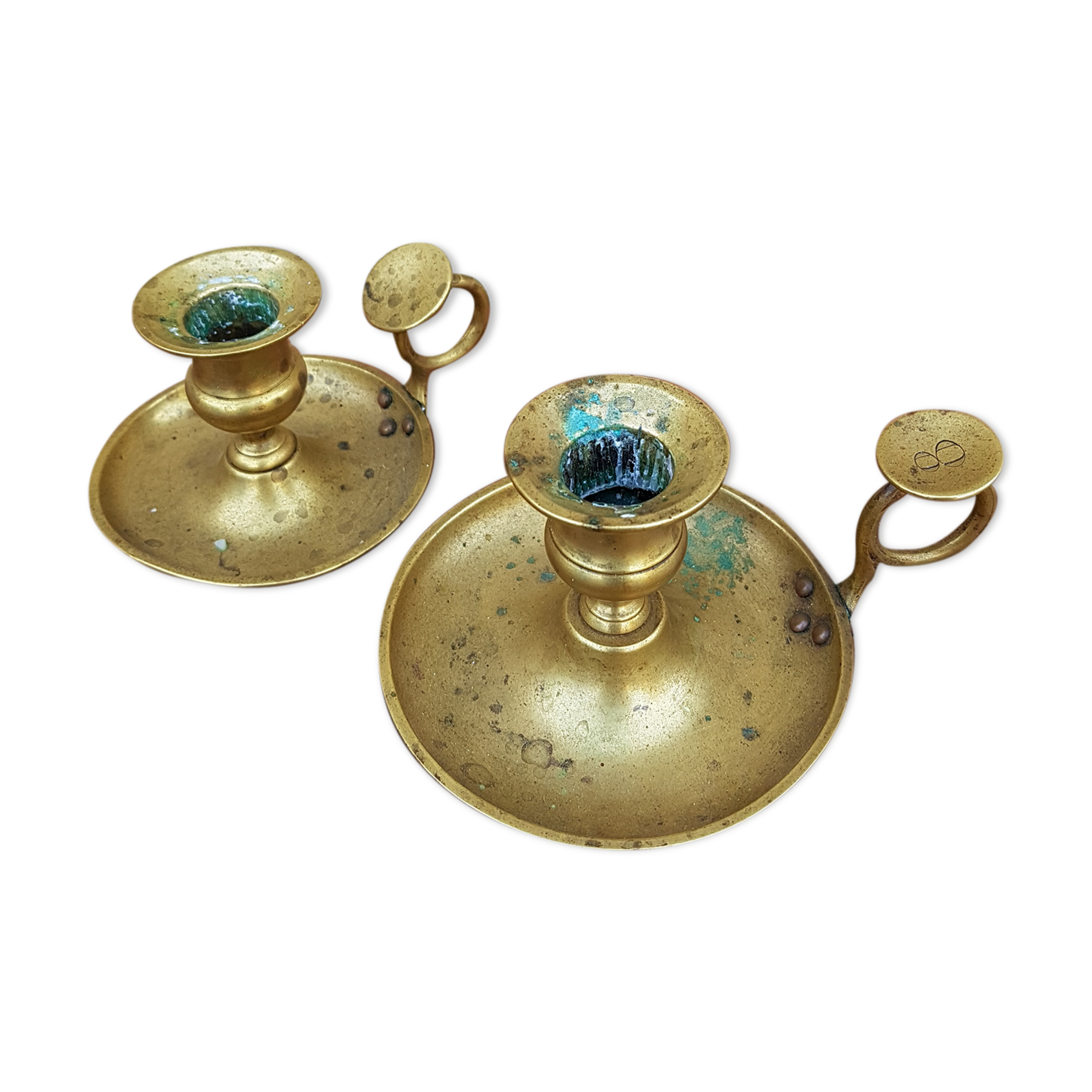Old pair of brass candlesticks cellar rats