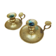 Old pair of brass candlesticks cellar rats