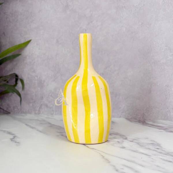 Striped yellow hollow bottle vase