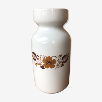 Porcelain pot or vase decorated with vintage brown flower.