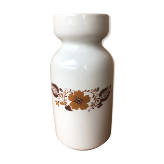 Porcelain pot or vase decorated with vintage brown flower.