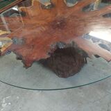 Round table carved from a wooden slice of PADOUK