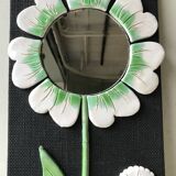 Ceramic flower mirror.