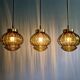 Set of 3 amber glass pendant lights, RAAK Amsterdam, 1970