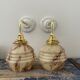 Pair of Art Deco wall lamps in marbled opaline