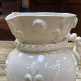 Pitcher and its glass in white earthenware from Malicorne