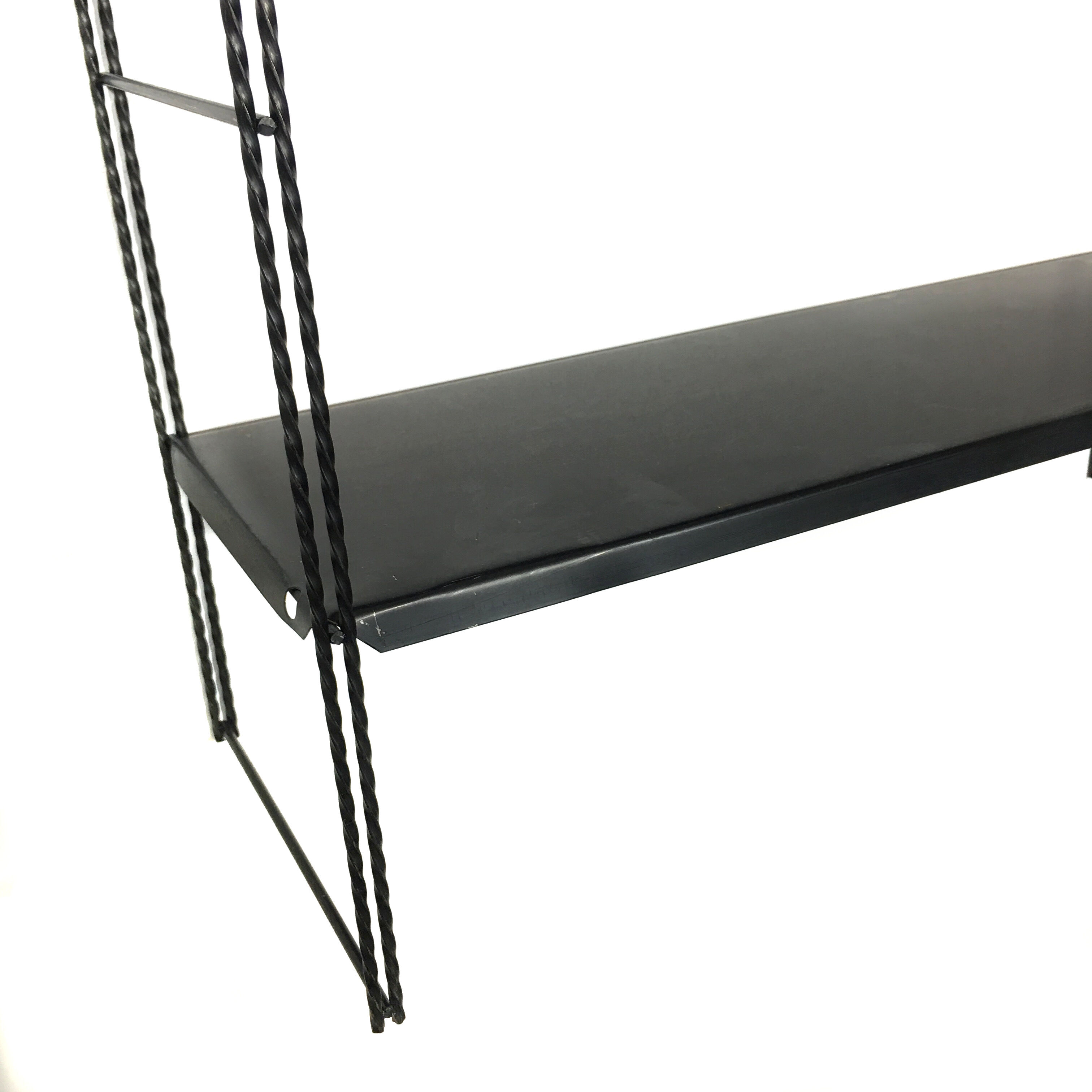 String black metal shelf