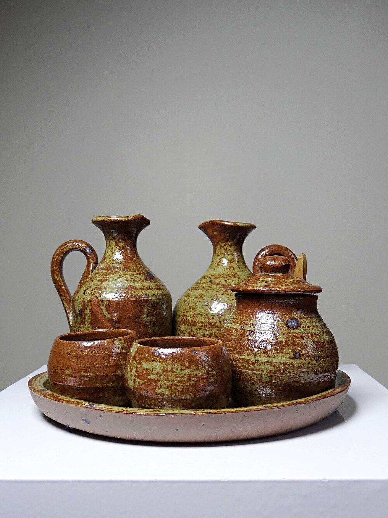 Vintage condiment service in glazed pyrite stoneware, artisanal Baudat La Borne style.