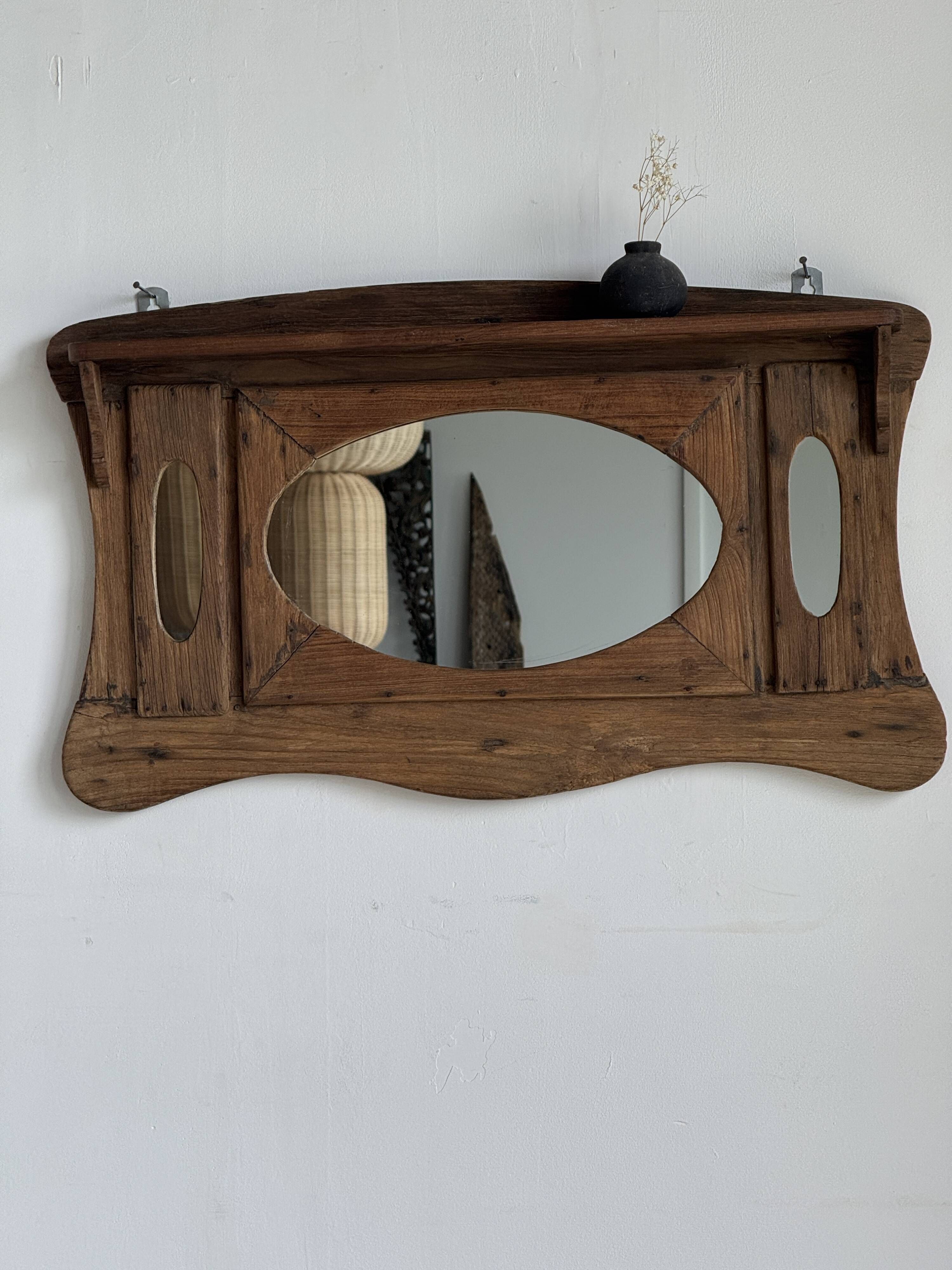 Small wall mirror in organic old Indonesian teak 75x45.