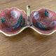 Empty pockets in brass and floral decoration