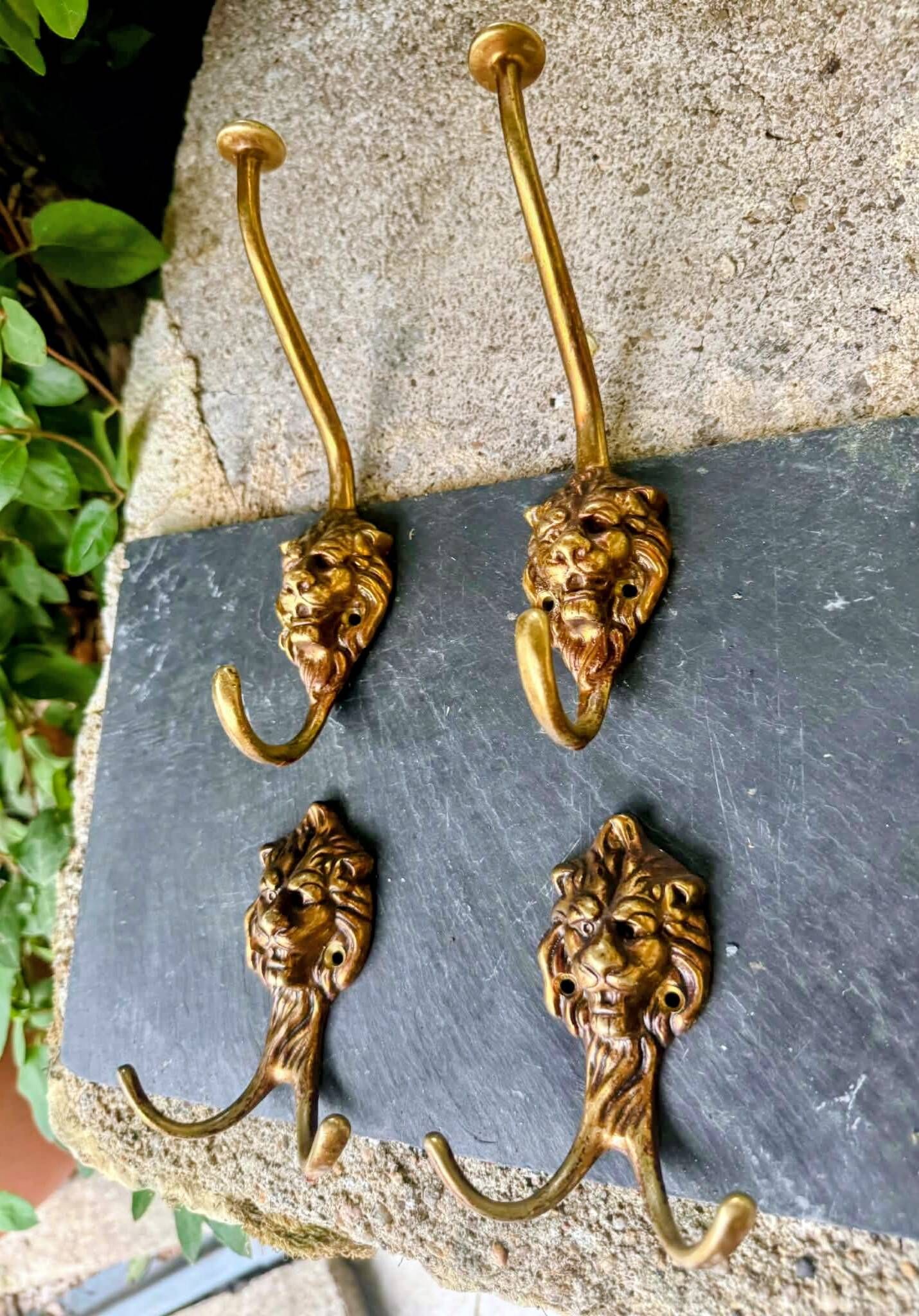 4 lion coat hooks in solid brass Art Nouveau