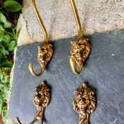 4 lion coat hooks in solid brass Art Nouveau