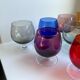 Set of 9 glasses with colored feet in blown glass 50s