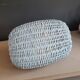 Turquoise-painted wicker basket