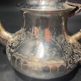 Silver metal teapot