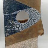 Pair of ceramic face vases