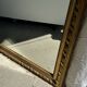 Large gilded mirror with acanthus leaf pediment H150 L98