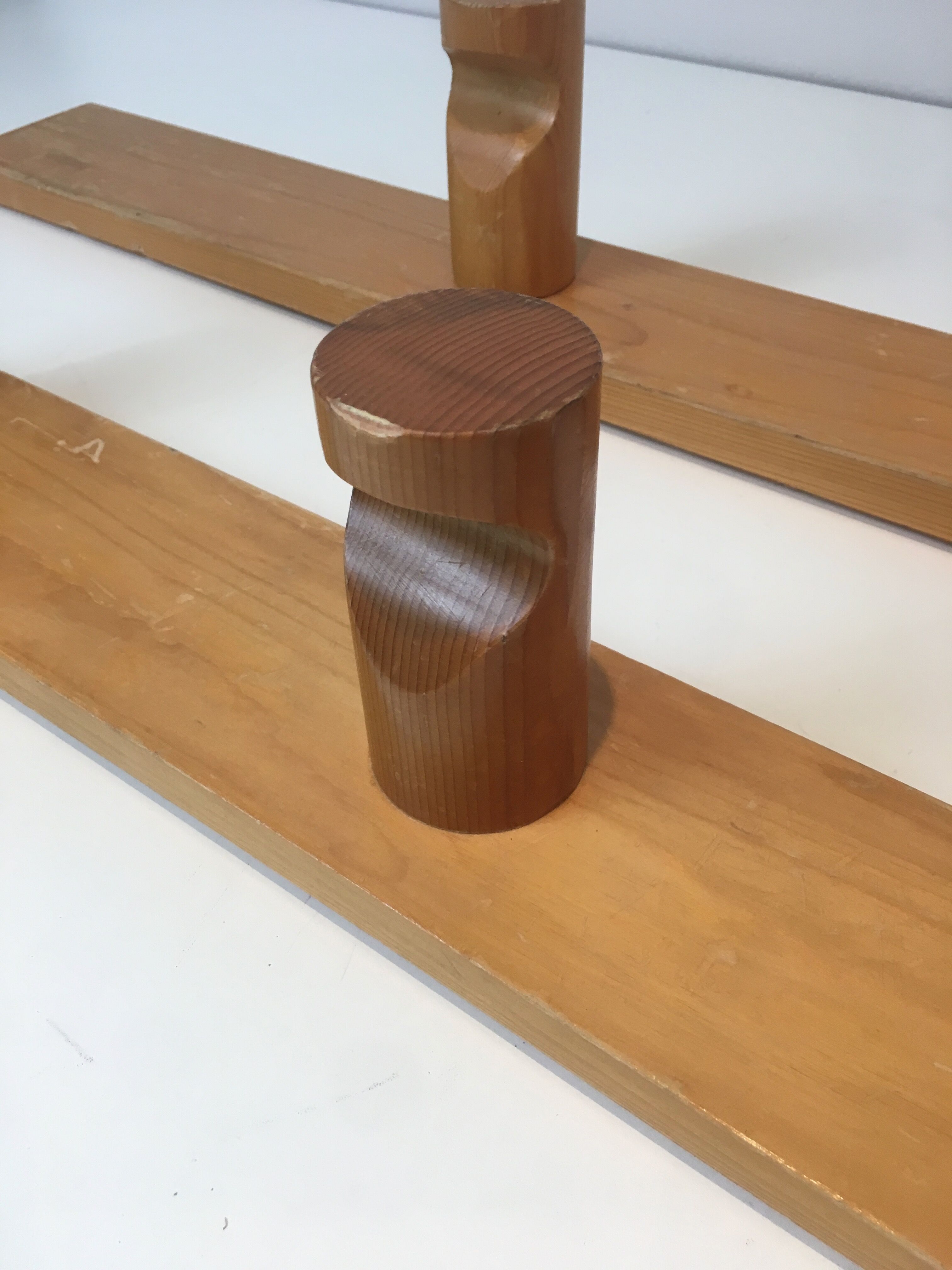 Charlotte Perriand, pair of fir wall coat racks, French work, around 1970