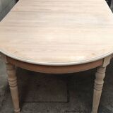 Round table with two raw cherry wood extensions