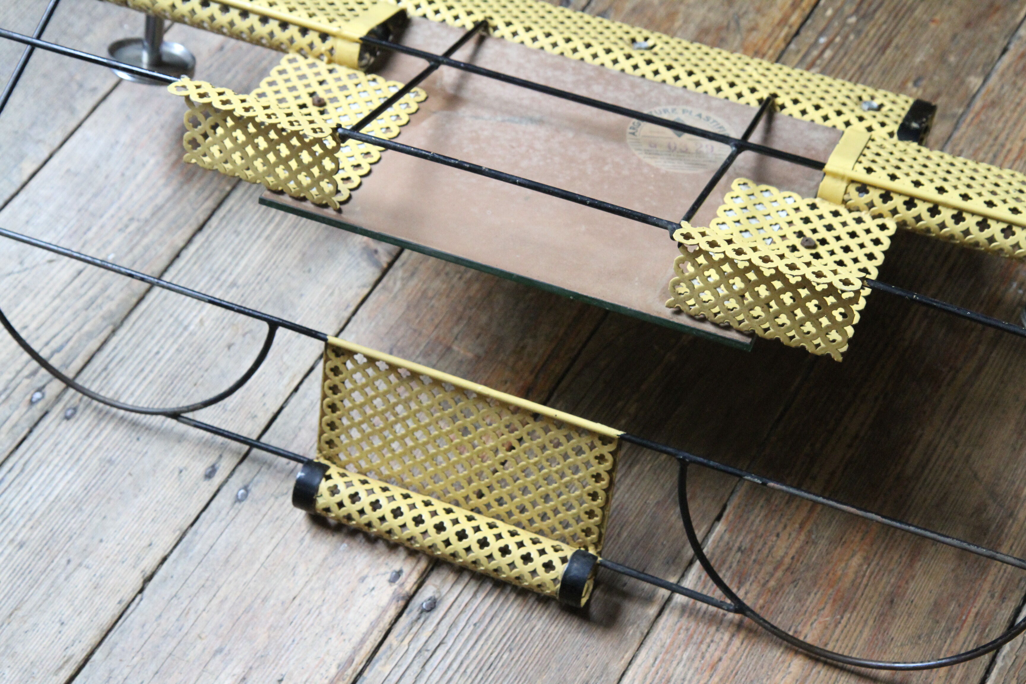 1950s perforated metal coat holder