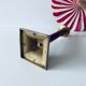 Old candle holder in brass and wood