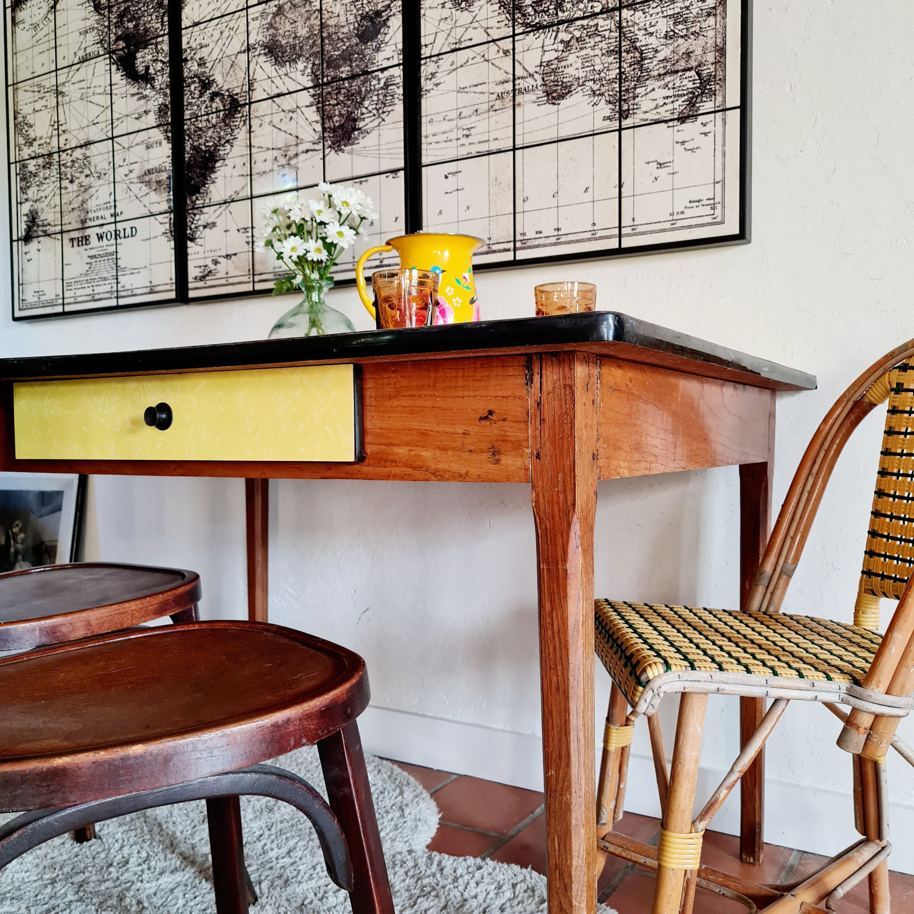 Old wooden farmhouse table and yellow formica top